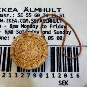 Woven Rattan Batik Lining Round Sling Bag.